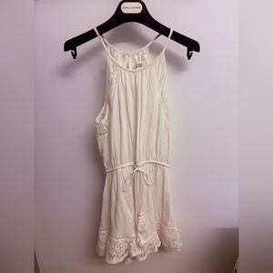 White crochet & lace romper by LF Seek
The Label